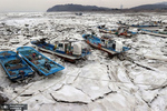 قایق های ماهیگیری در آبهای یخ زده اسکله یدان در اینچئون، کره جنوبی. عکس: YONHAP

